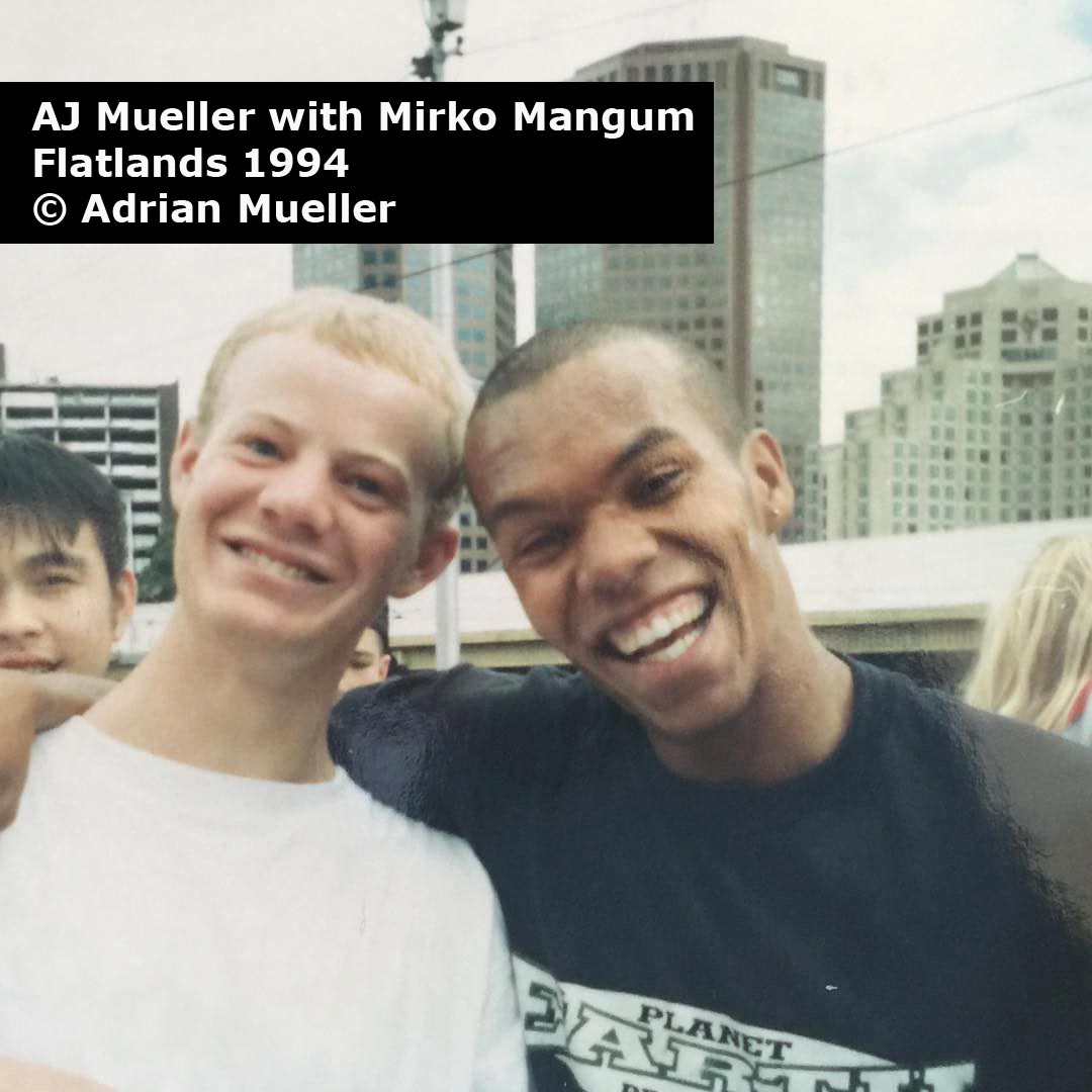 Photo from 1994 featuring AJ Mueller with Mirko Mangum at Flatlands in Melbourne. 
        AJ and Mirko are both smiling a lot.